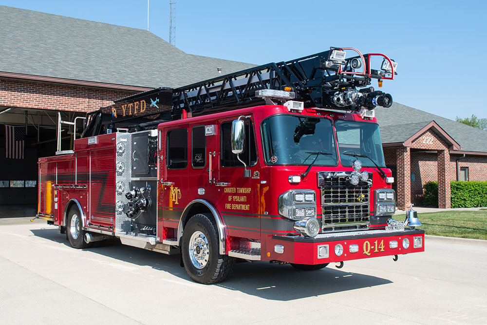 Q-14 Quint Ladder Truck parked in front of the Main Fire Station